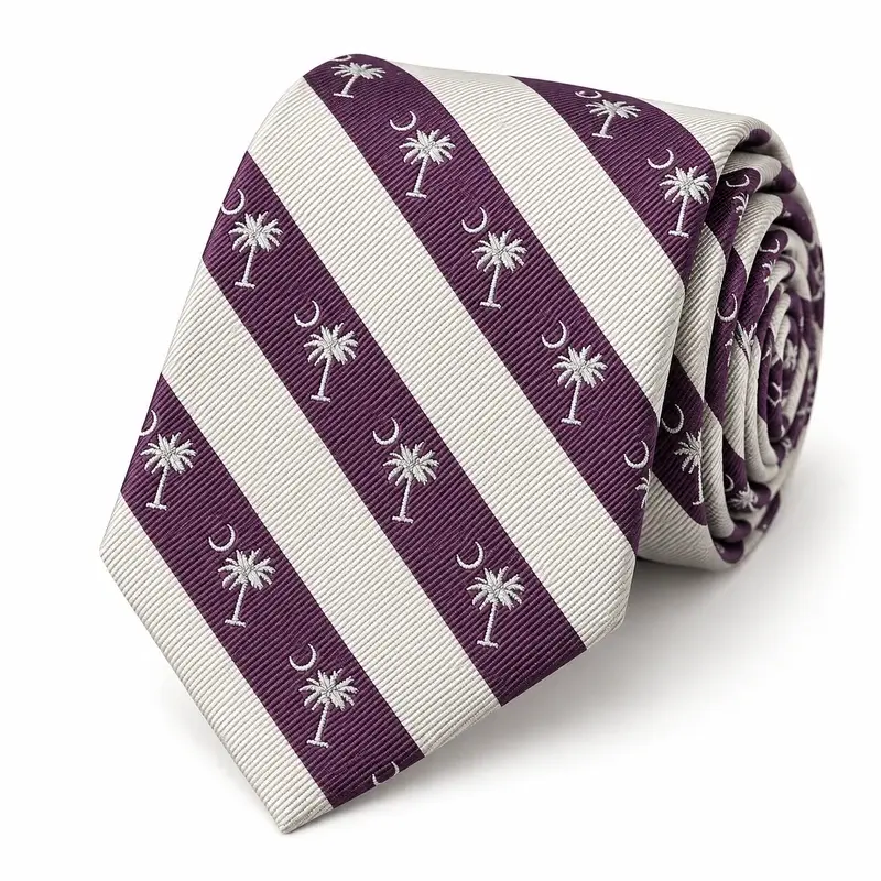 Rolled purple and ivory striped silk jacquard tie with woven motifs.