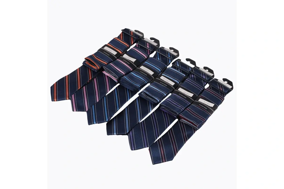 Six striped ties with paper bands and hangers.