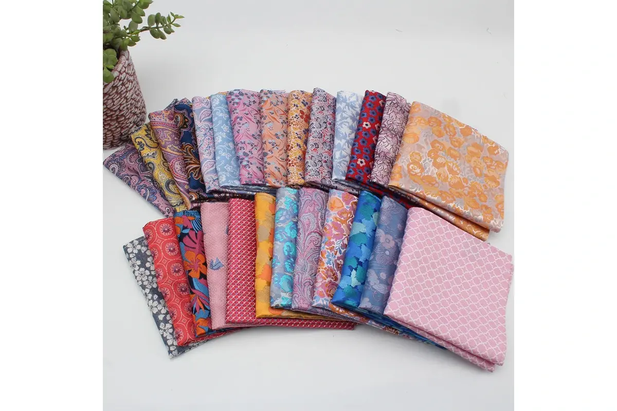 Folded fabrics in assorted colors and patterns.