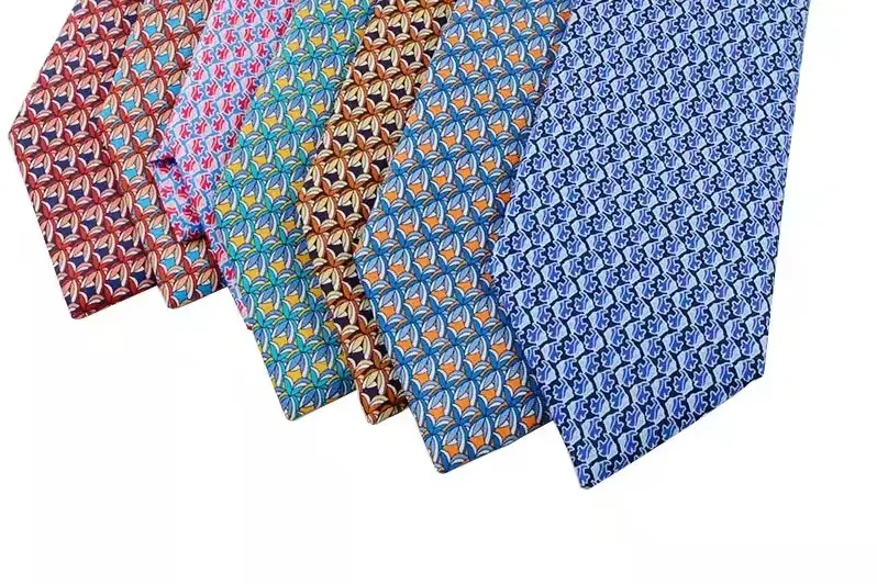 Six colorful neckties with repeating patterns.