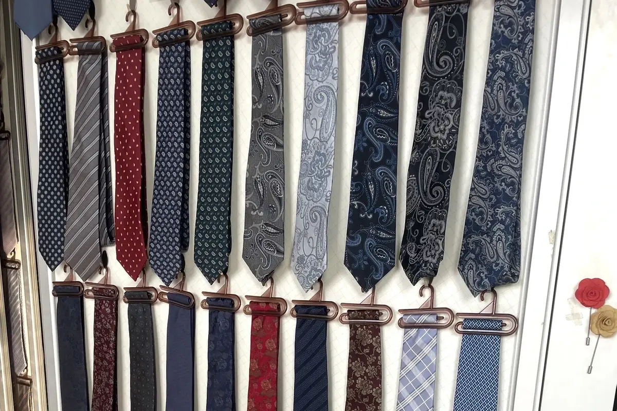Patterned ties displayed in polka dot, paisley, stripe and check designs