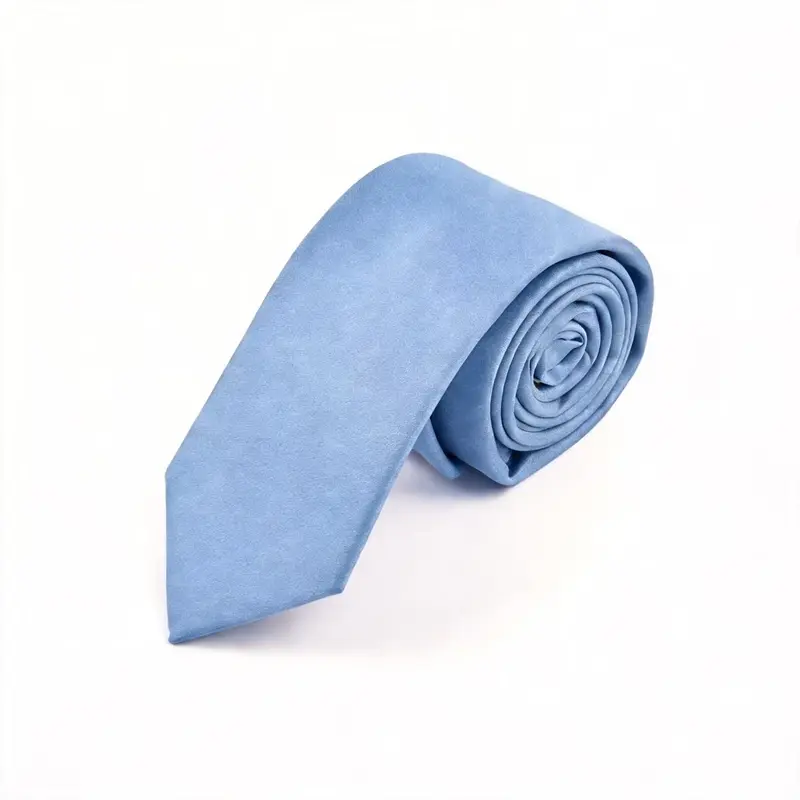 Rolled pale blue tie with a subtle tonal pattern.