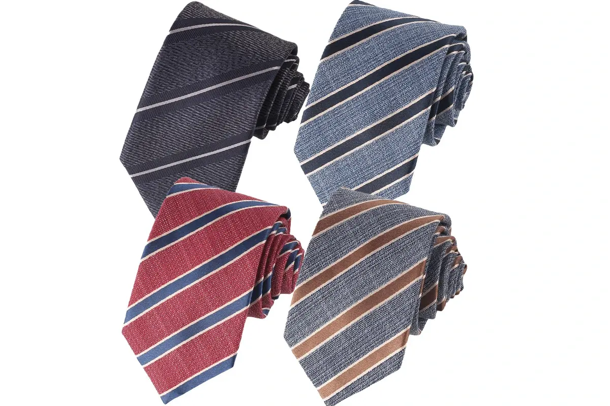 Four rolled striped ties in charcoal, blue, burgundy and brown colors.