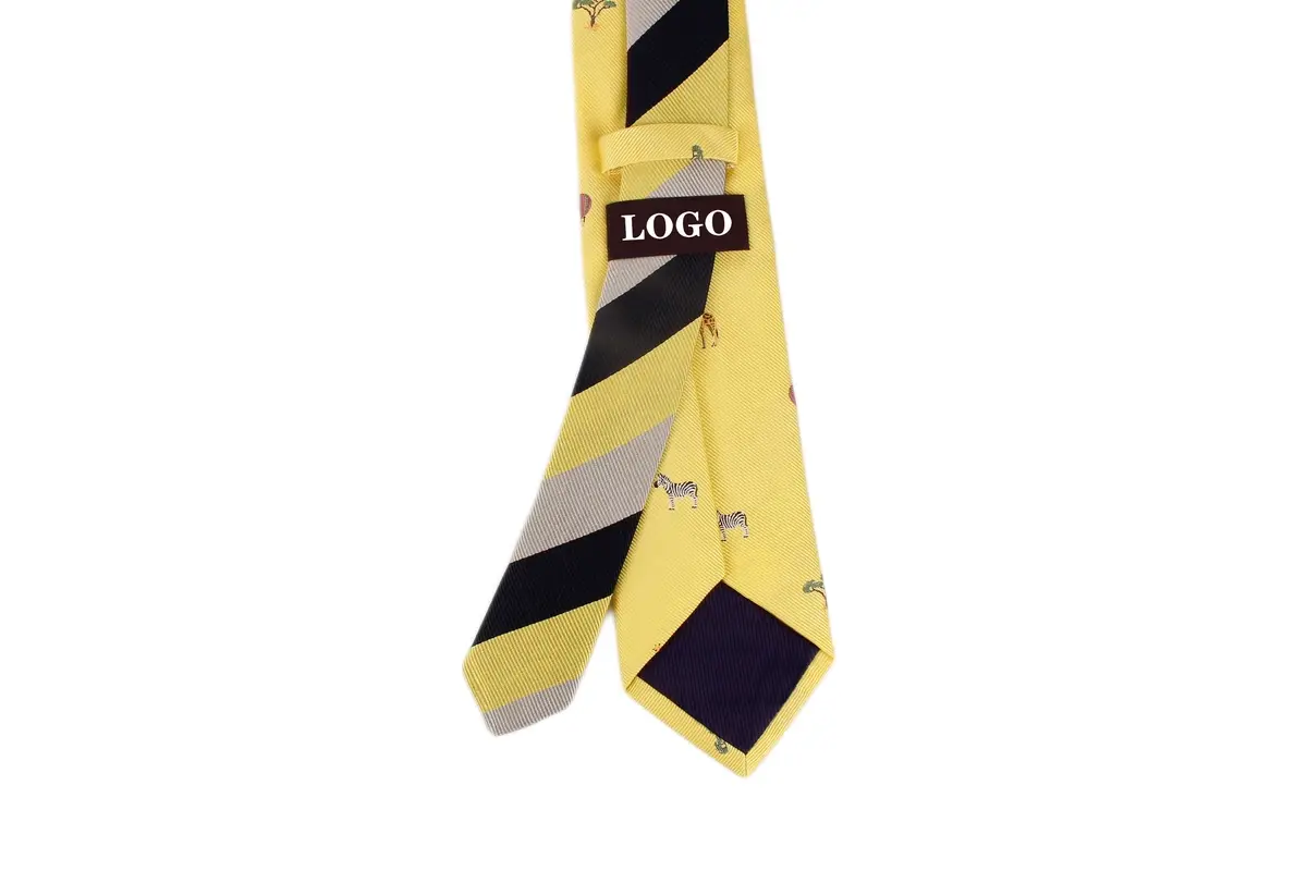 Sample logo label on reverse of a yellow patterned tie with a striped tail.