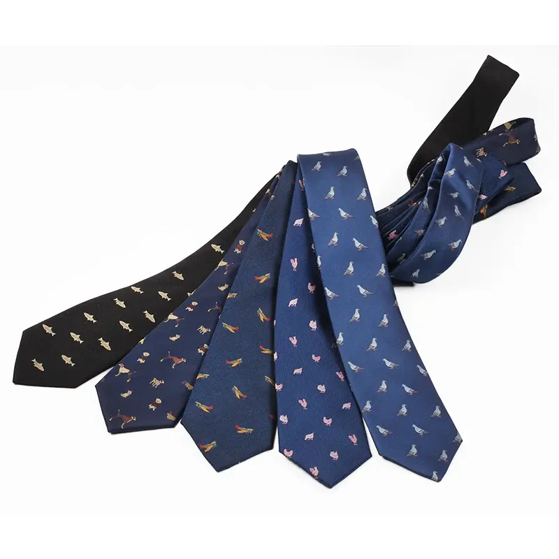 Three navy and black ties with small repeating animal motifs.