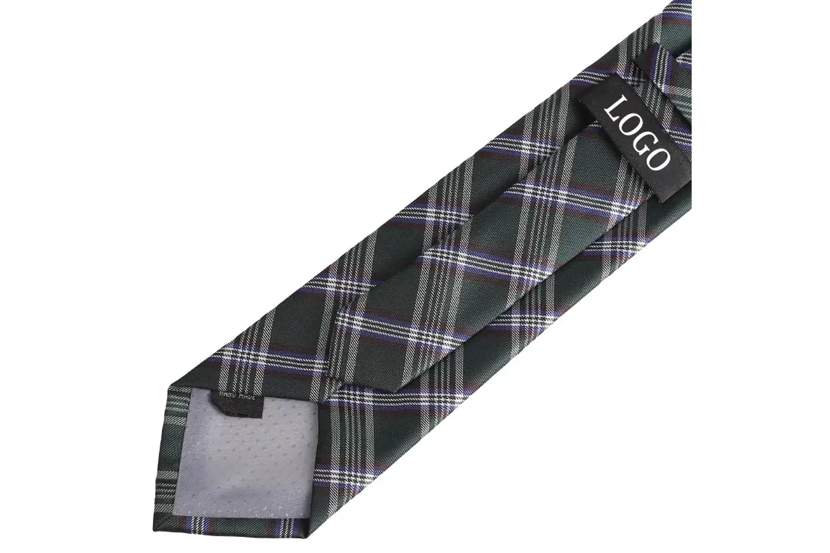 Sample logo label attached to the reverse of a green and grey checked tie.