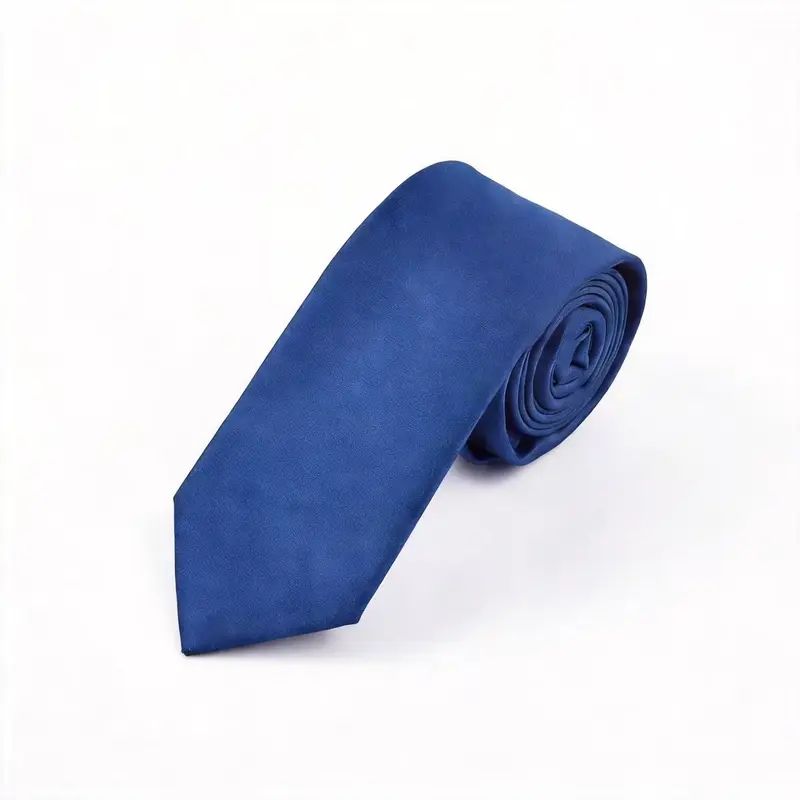 Rolled blue tie with a subtle tonal surface pattern.