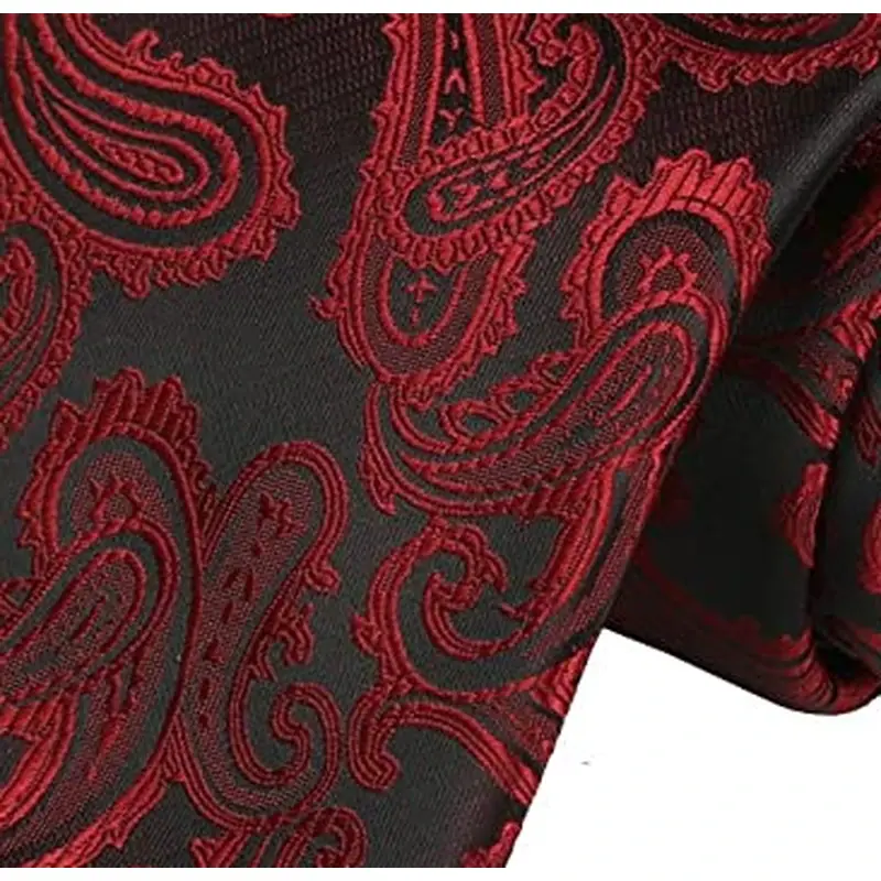 Close-up of red and black paisley necktie