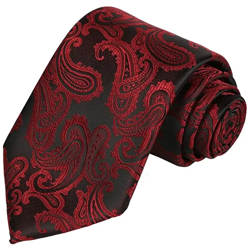 Red and black paisley necktie on white background