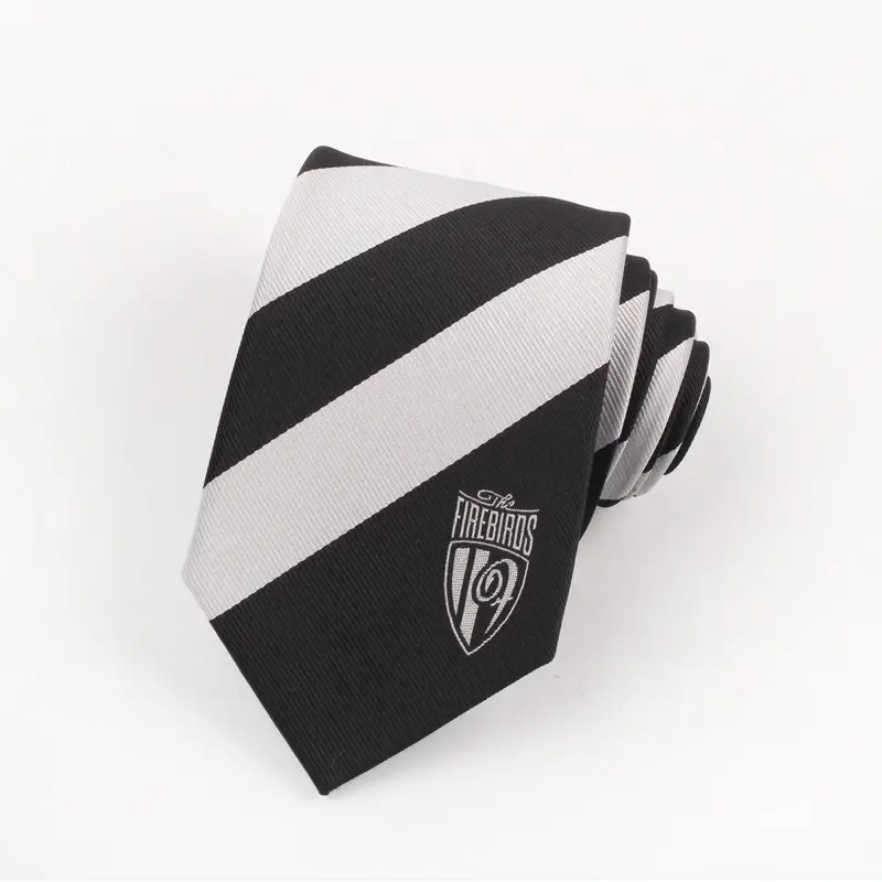 Black and white striped tie with a crest motif near the blade tip.