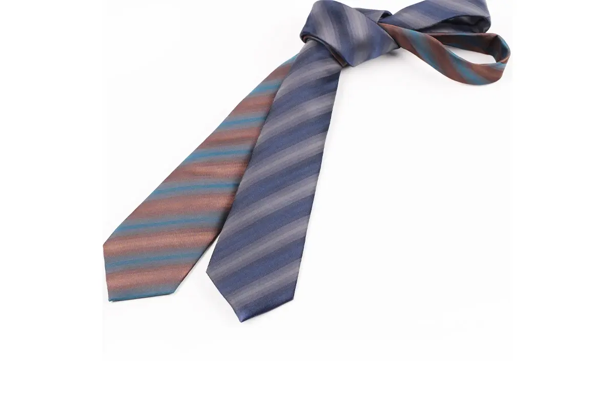 A full-length knotted tie with alternating orange and blue diagonal stripes.