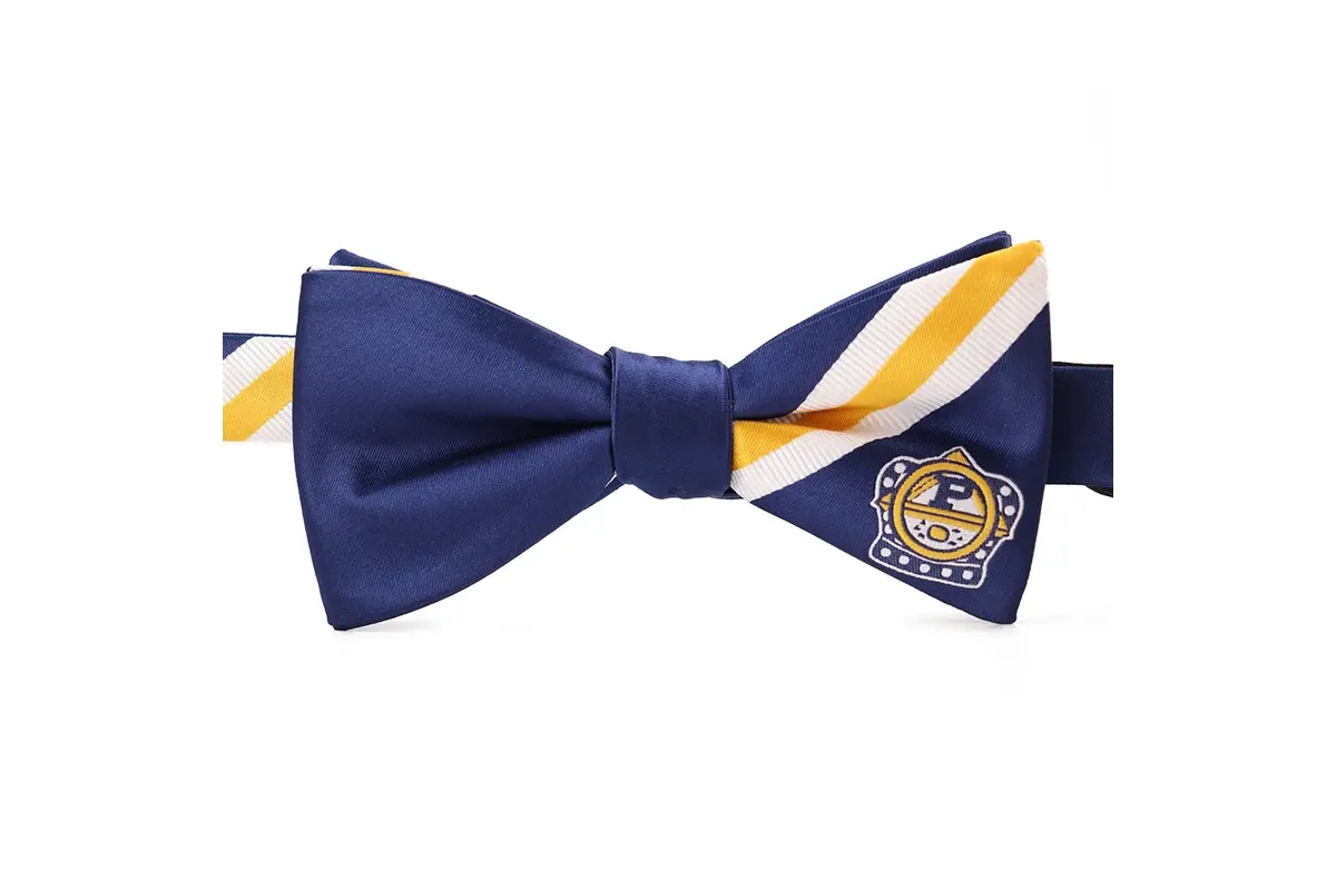 Navy and yellow pre-tied bow tie with a crest positioned on the right wing.