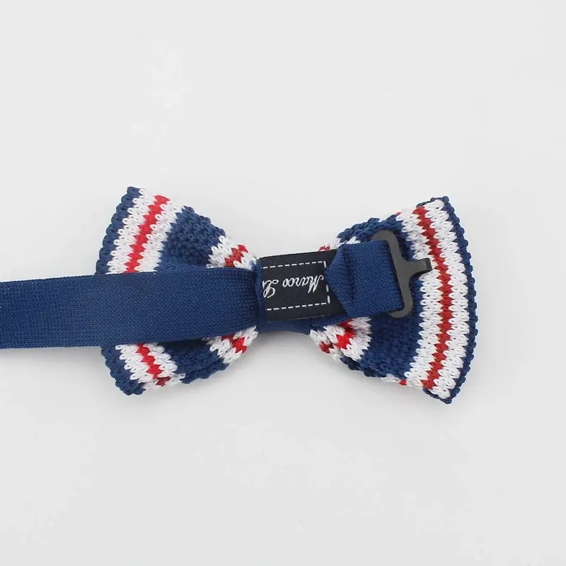 A striped bow tie with the adjustable navy strap and sewn black label.