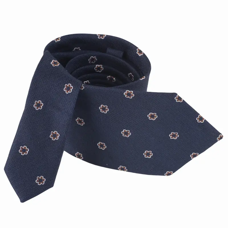 Navy necktie with small repeating floral motifs
