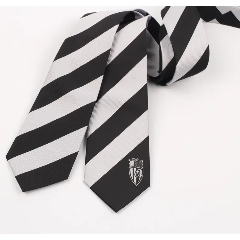 Black and white striped tie with a crest near the blade tip.