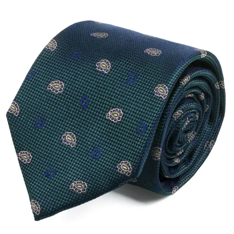 Green necktie with small repeating motifs