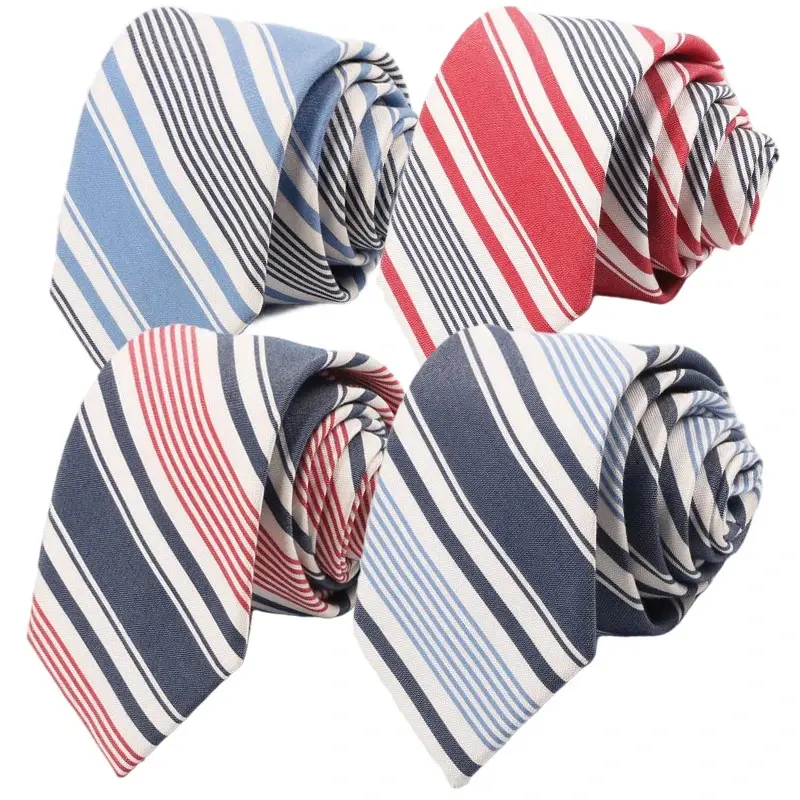 Four rolled ties with fine diagonal stripes in blue, red and grey colors.