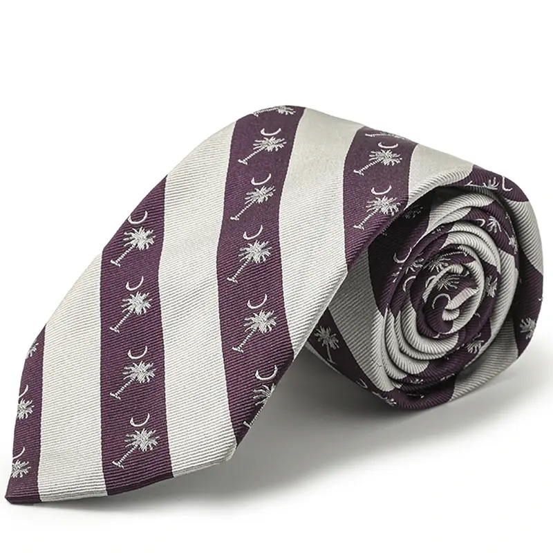 Rolled plum and ivory striped tie with repeating palm and crescent motifs.
