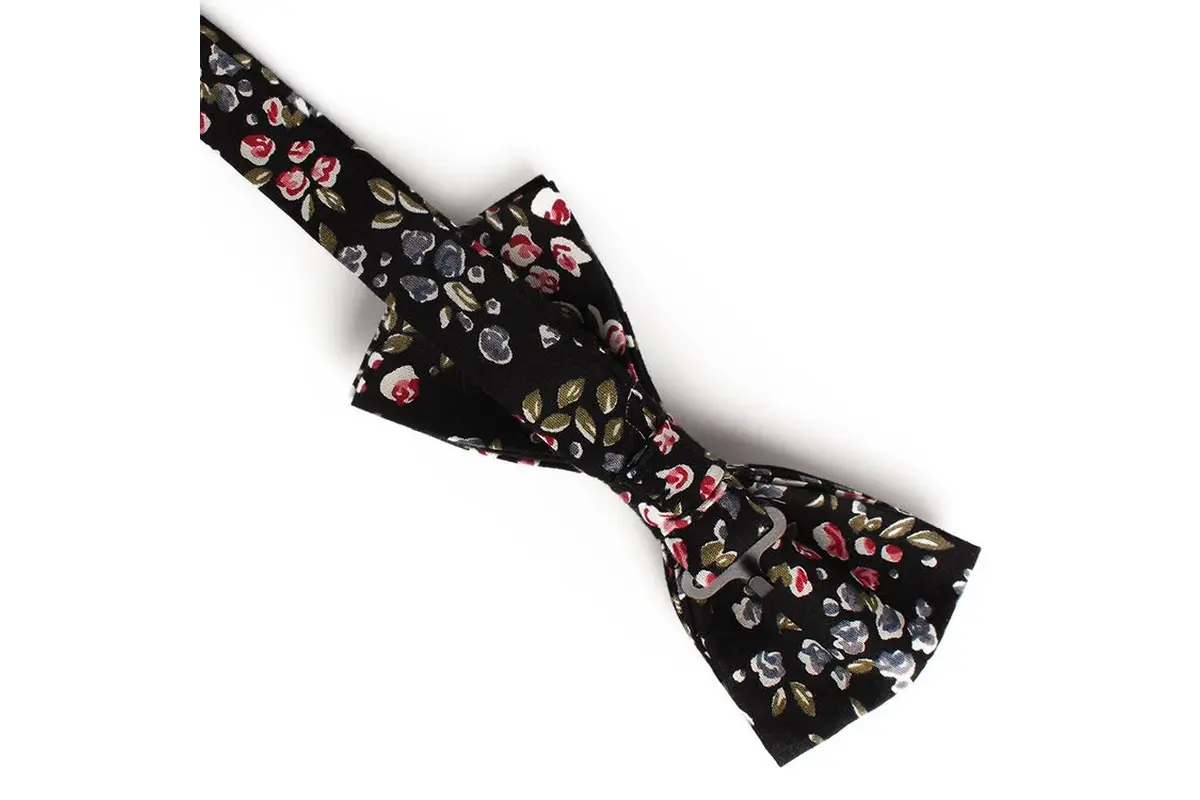 Black self-tie bow tie with a multicolor floral pattern.