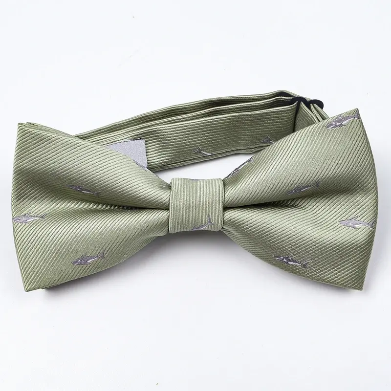 Sage green pre-tied bow tie with fine woven diagonal texture.