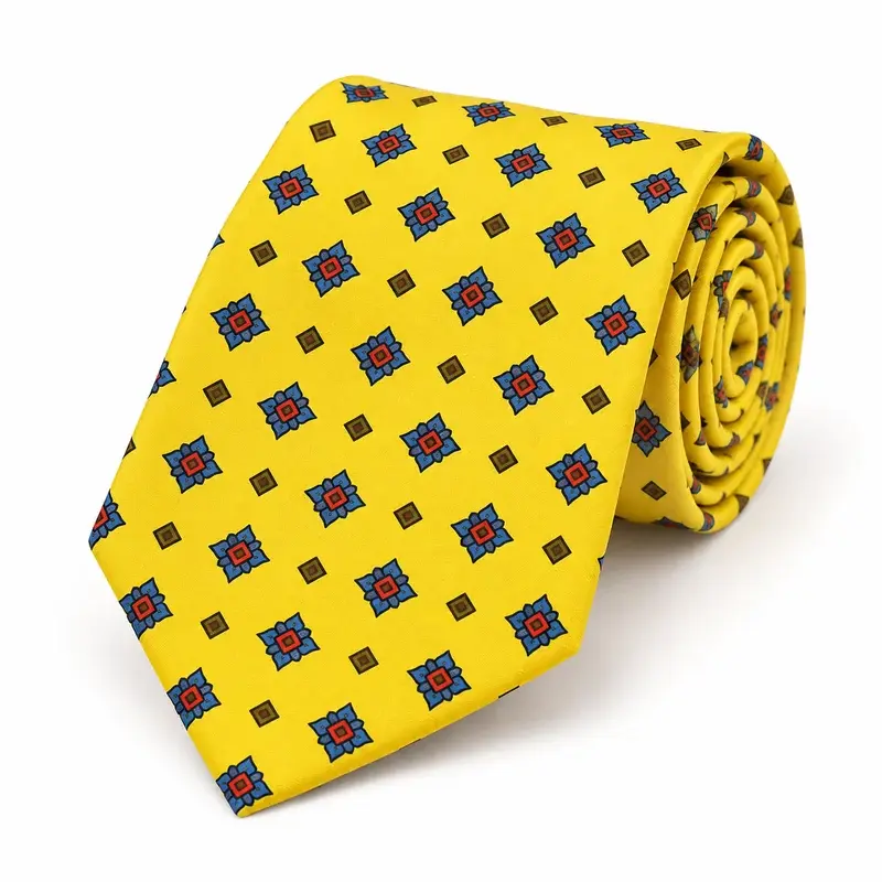 Yellow necktie with dark geometric motifs