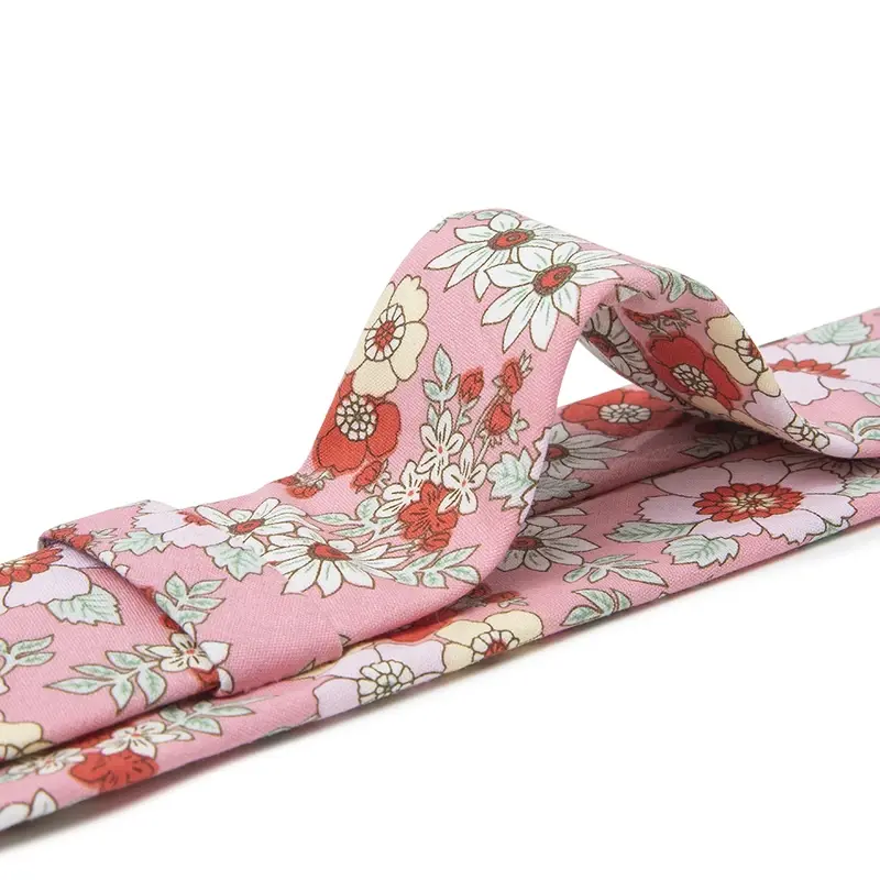 Pink floral necktie on white background