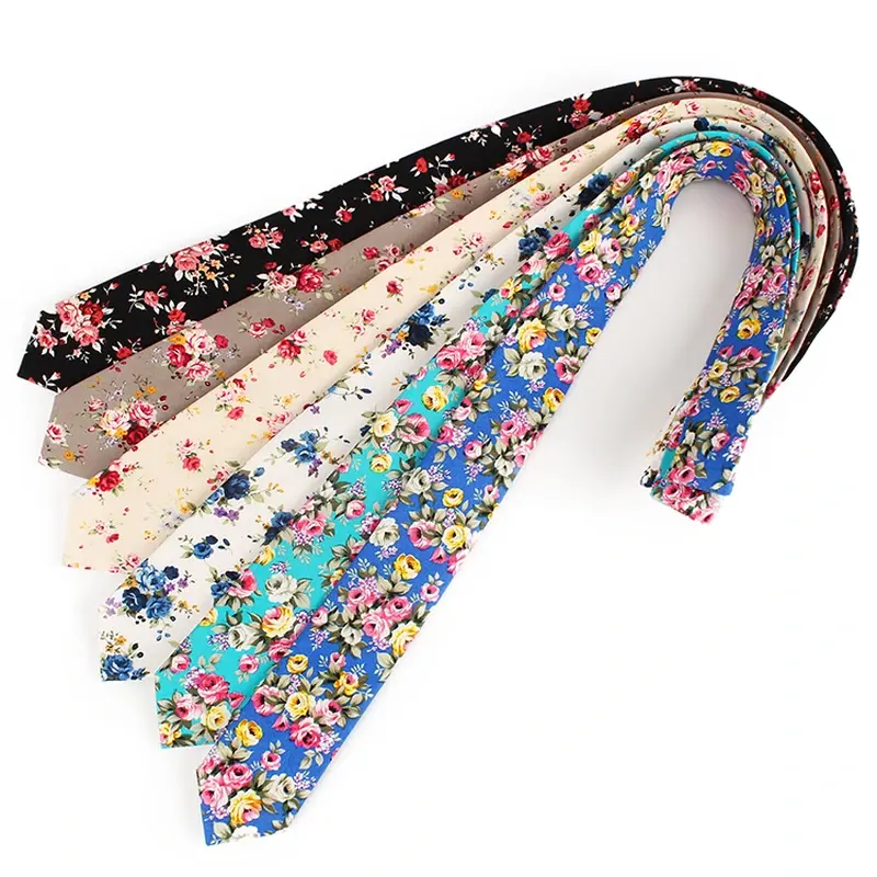 An assortment of ties with detailed multicolor floral patterns.