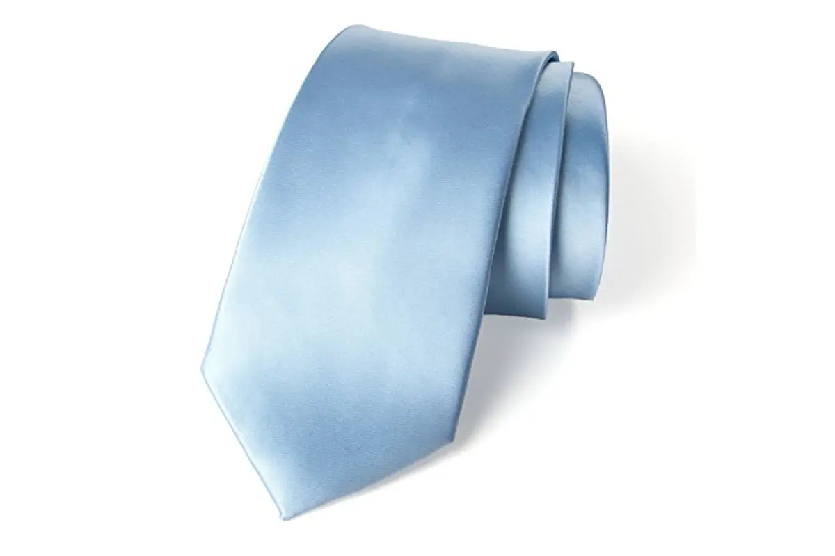 Rolled light blue tie with a smooth reflective face and soft highlights.