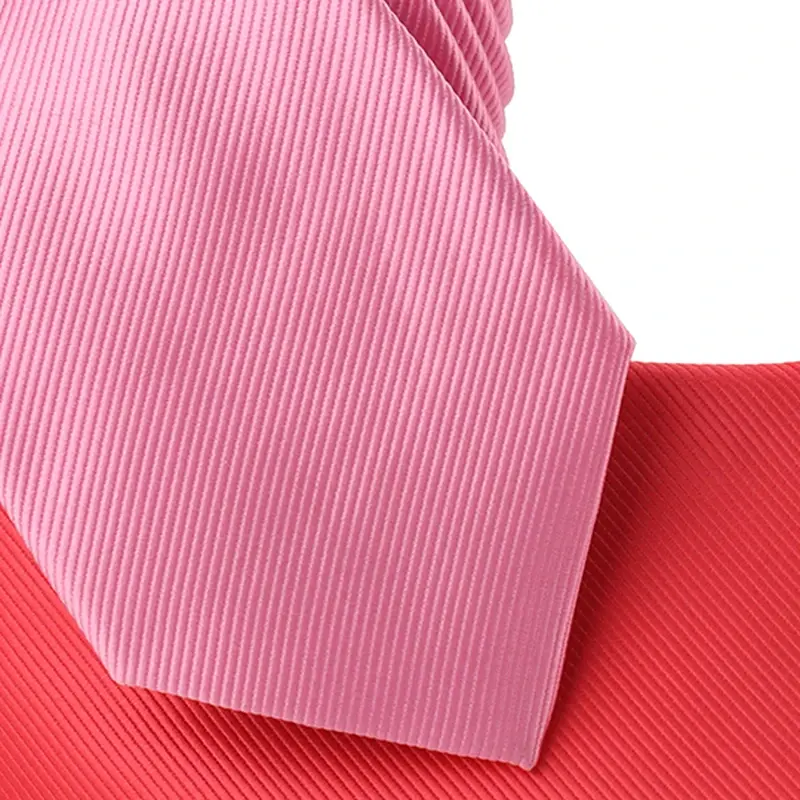 Close-up of pink and red neckties