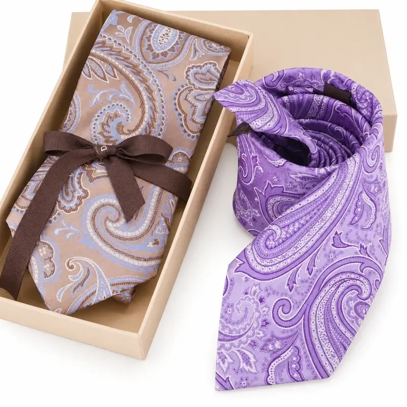 Paisley silk ties displayed with an open rigid gift box.