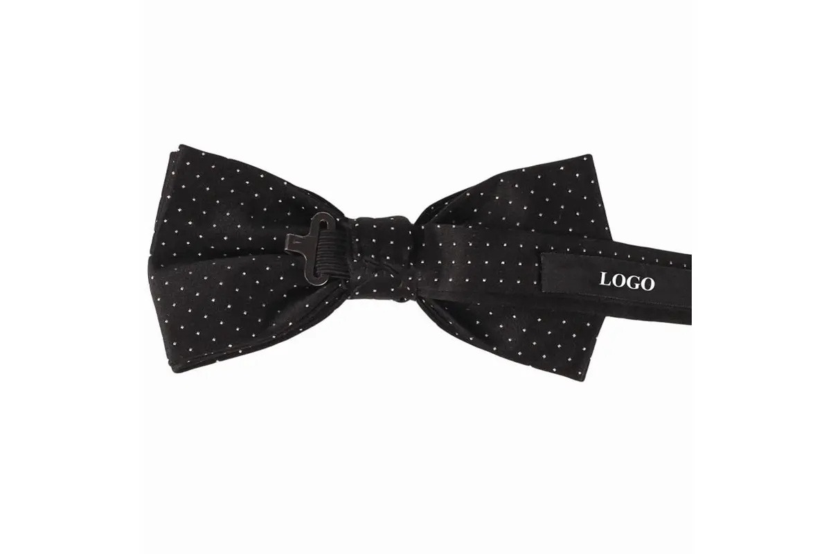 Black dotted bow tie reverse showing its clasp, strap and sample LOGO label.