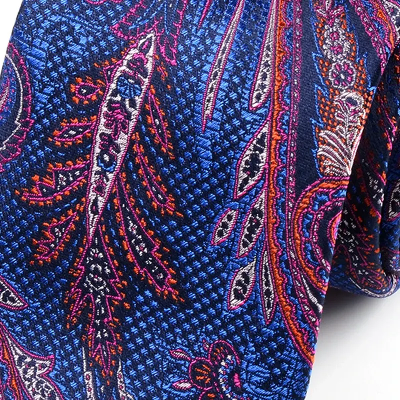 Close-up of blue and burgundy paisley necktie