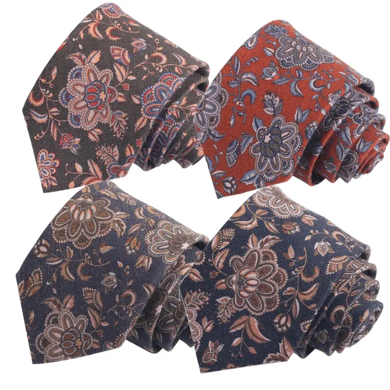 Four floral patterned ties in brown, red and blue colorways.