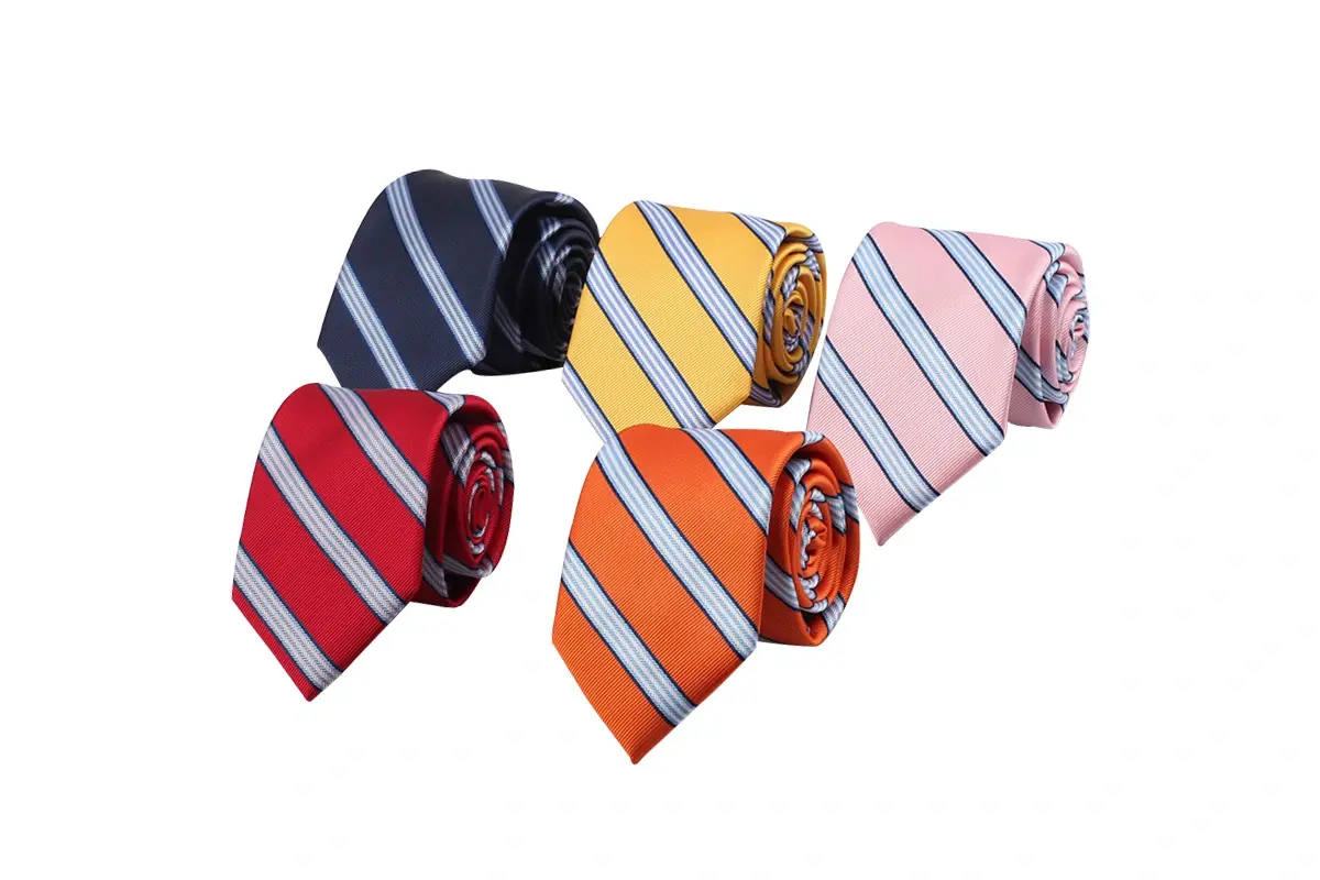 Five rolled striped ties in navy, yellow, pink, red and orange.