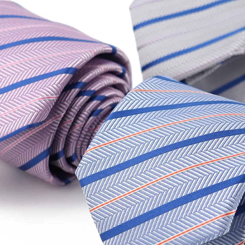 Close-up of pastel neckties with diagonal stripes