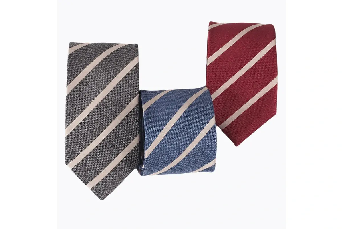 Gray, blue and burgundy rolled ties with matching pale diagonal stripes.