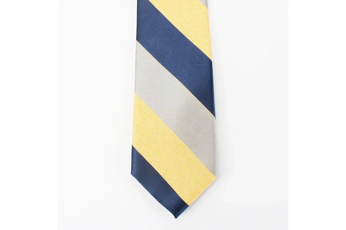Tie blade showing broad yellow, navy and cream diagonal bands.
