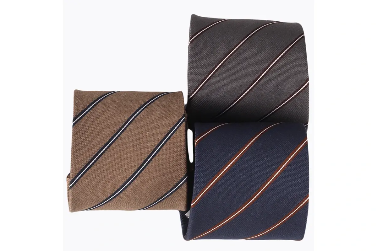 Three tie blades with fine diagonal accent stripes on brown, charcoal and navy.