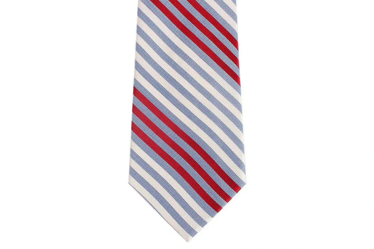 alternating red, pale blue and ivory stripes across a woven tie blade.