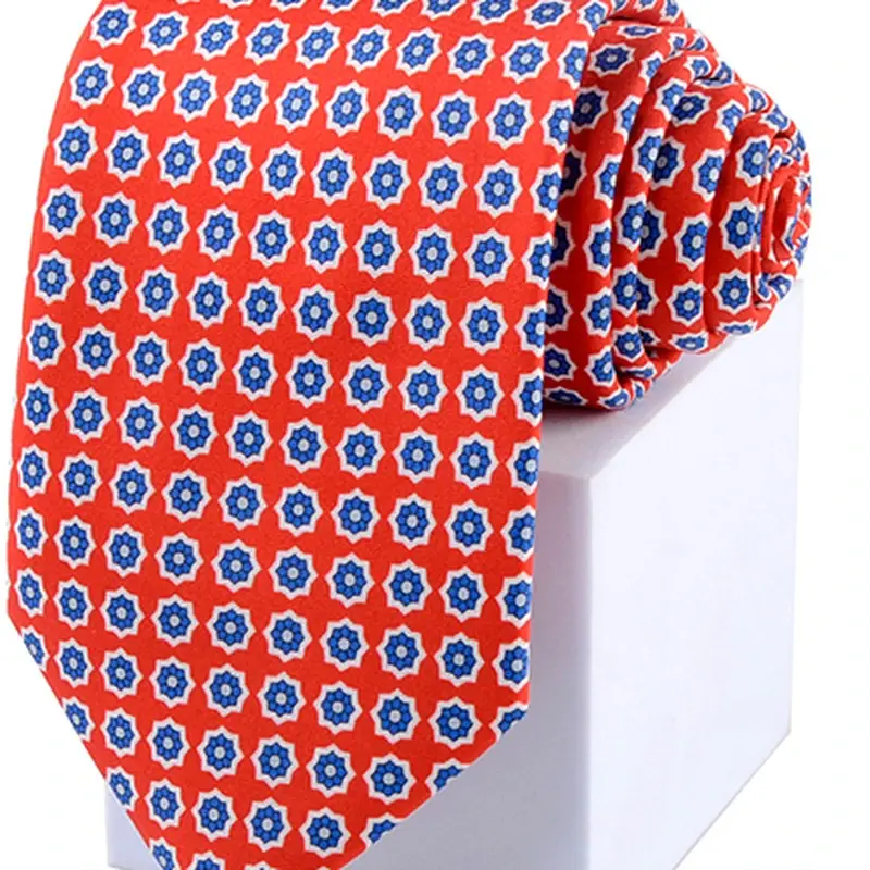Close-up of orange and blue geometric necktie
