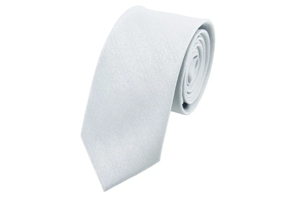 Rolled pale silver-blue tie showing its plain surface and blade shape.