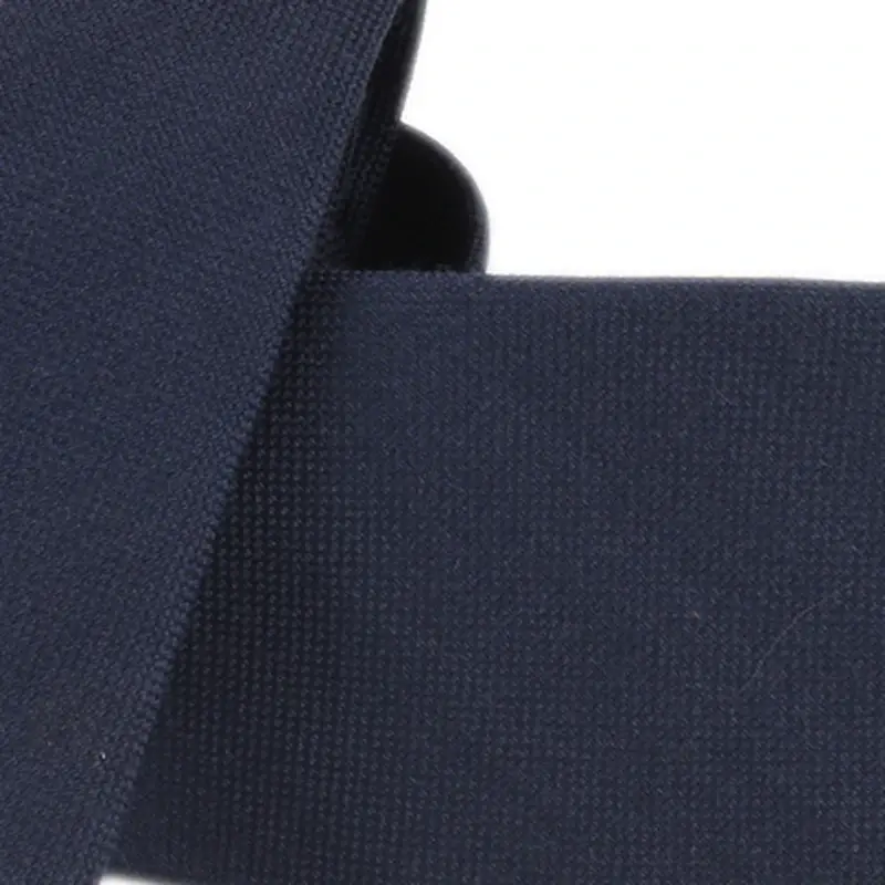 Close view of dark navy necktie fabric