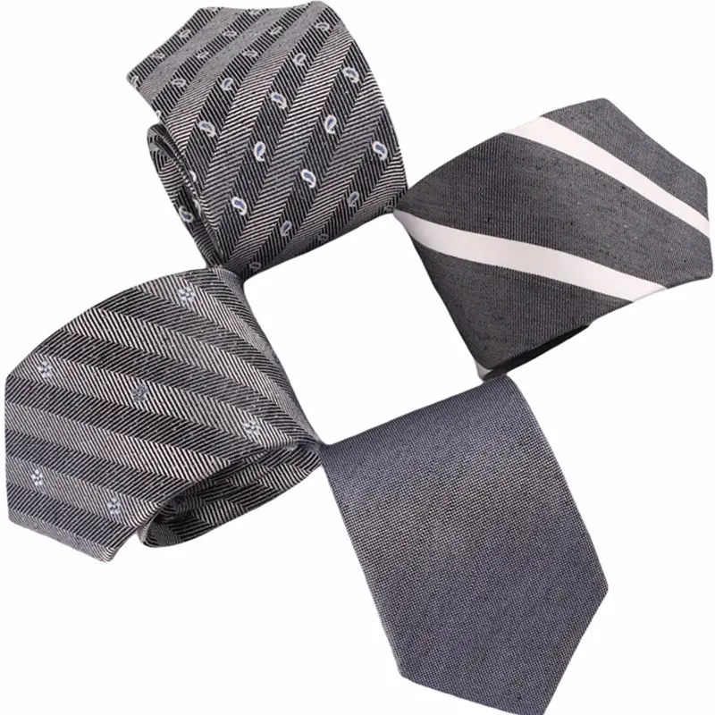 Four gray ties with fine patterns, diagonal stripes and tonal textures.