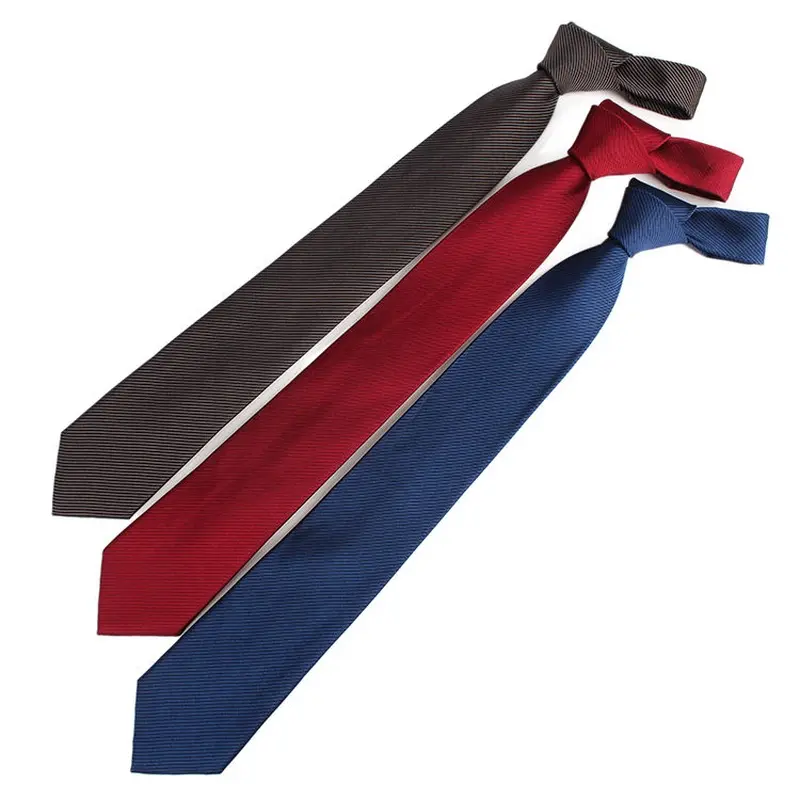 Three knotted plain ties in dark gray, burgundy and navy.