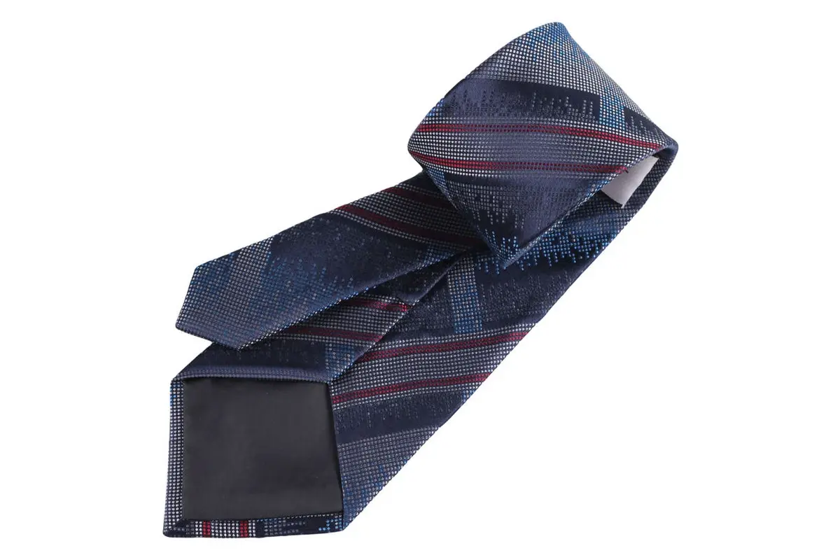 Folded navy striped tie with the front pattern, knot area and reverse tipping.