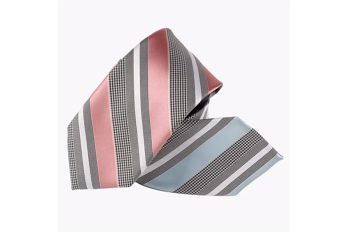 Two rolled gray ties with broad pink and blue diagonal stripes.