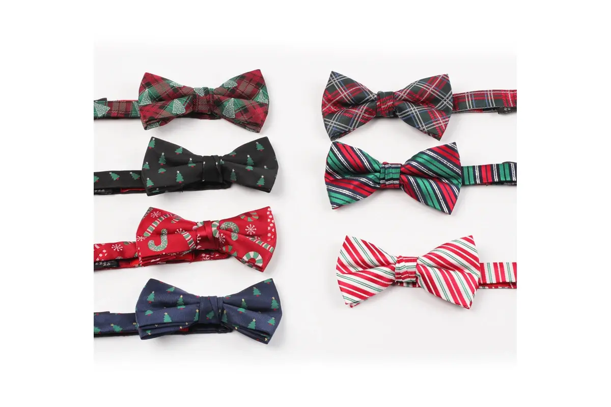 Seven bow ties with plaid, stripe and small holiday motifs by variant.