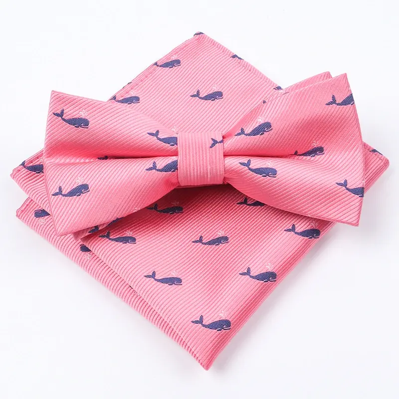 Pink bow tie and matching pocket square with repeated navy animal motifs.