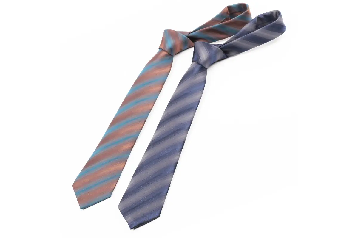 Two knotted striped ties laid out with their full front blades visible.