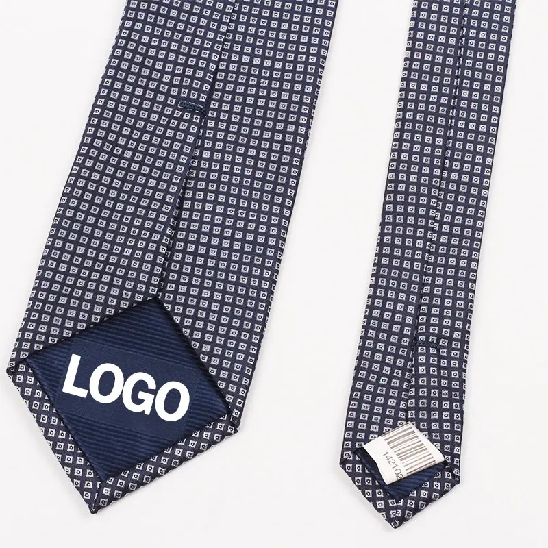 Small geometric-pattern tie with a sample logo on the tipping and a barcode tag.